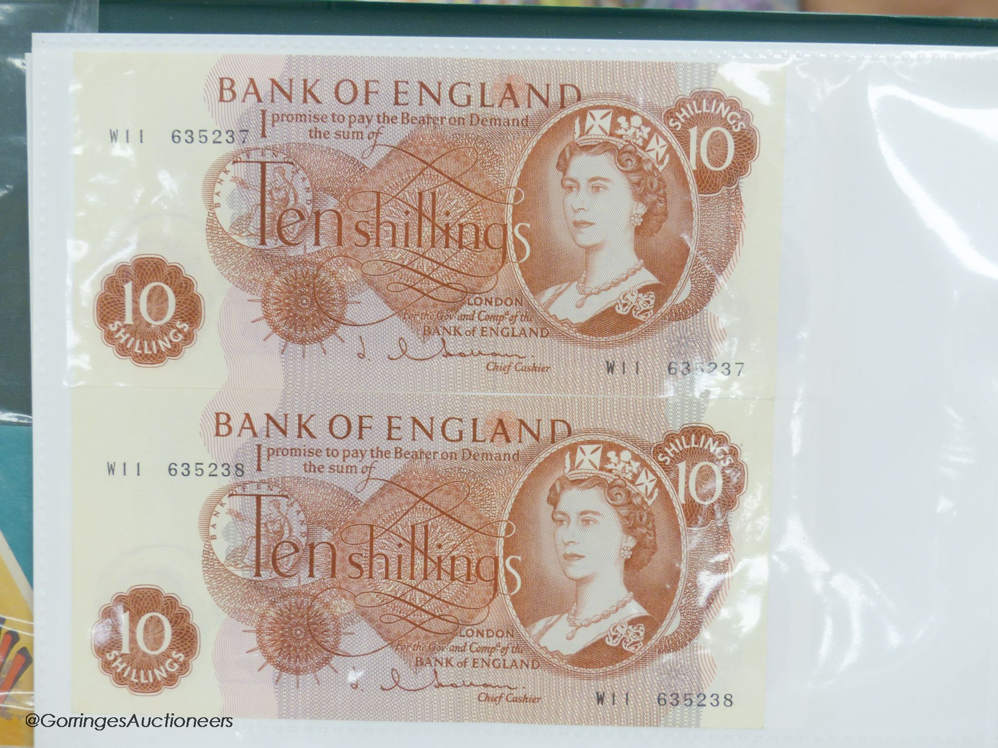 A collection of Bank of England and Scottish banknotes to include: 21 QEII 10 shillings, 14 O'Brien and Beale 10 shillings, 1 Peppiatt 10 shillings, 4 Hallam one pound notes, 18 O'Brien or Beale one pound notes, 8 Peppia